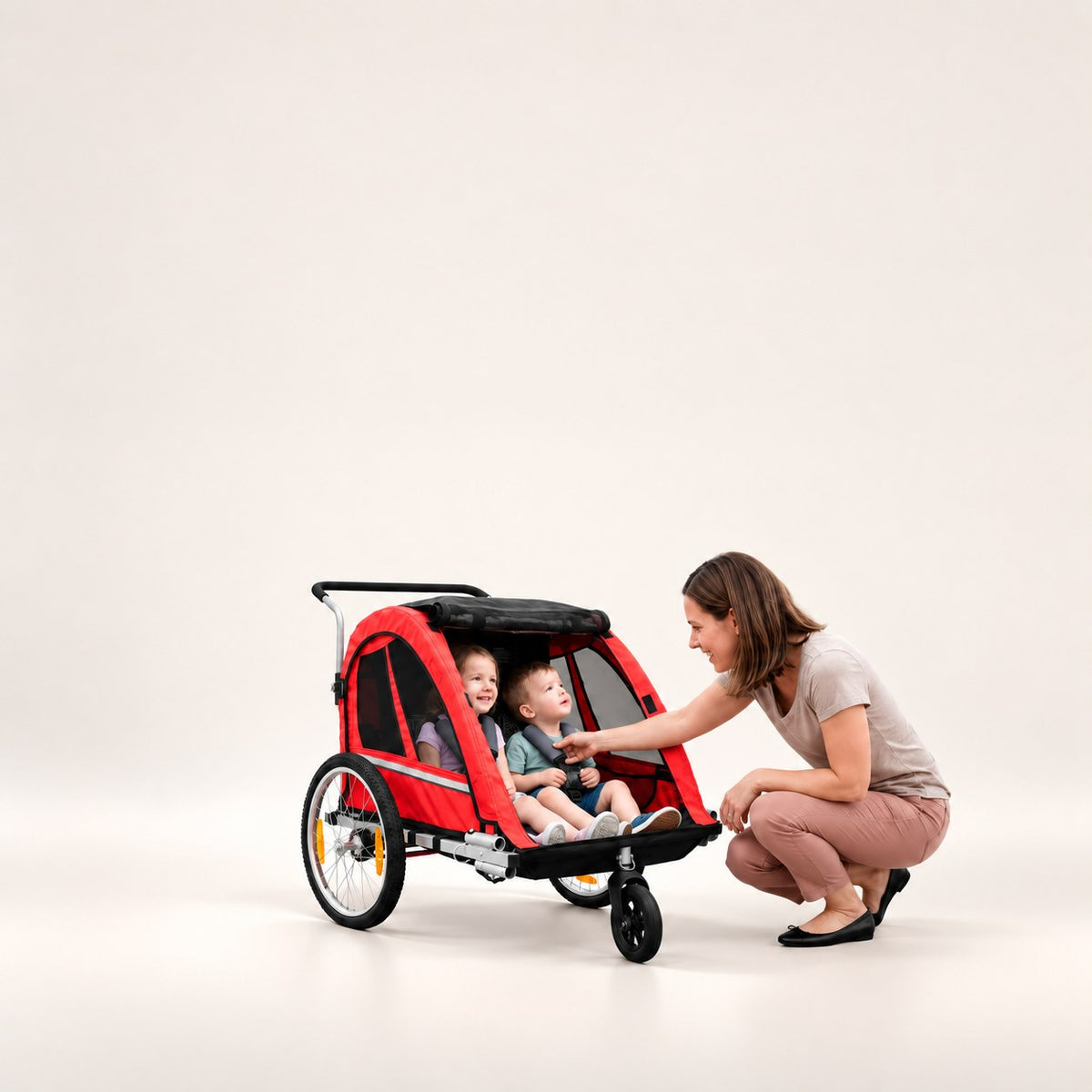 Fahrradanhänger für E-Bikes bei Wheelyshop – roter Anhänger mit zwei Kindern